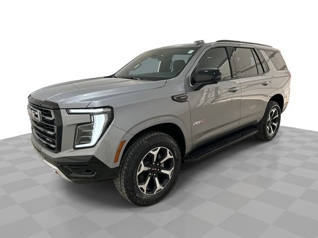 2026 GMC Yukon AT4 in Sterling Metallic — front three-quarter view
