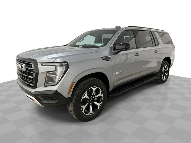 2026 GMC Yukon XL AT4 in Sterling Metallic — front three-quarter view