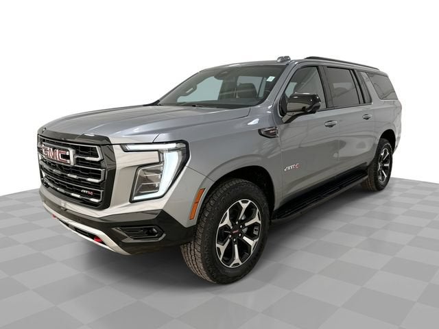 2026 GMC Yukon XL AT4 in Sterling Metallic — front three-quarter view