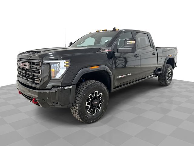 2026 GMC Sierra 2500 HD AT4X in Onyx Black — front three-quarter view
