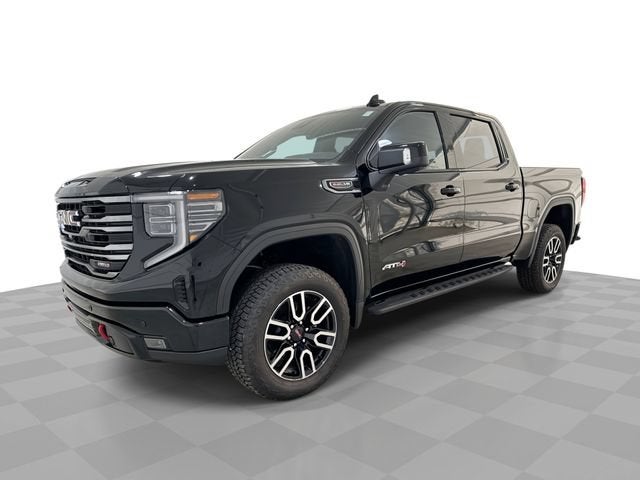 2026 GMC Sierra 1500 AT4 in Onyx Black — front three-quarter view