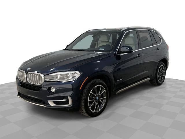 2018 BMW X5 sDrive35i in Blue — front three-quarter view
